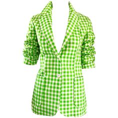 Make a statement in this chic never worn 1970s LARRY LEVINE cotton blazer jacket! Features lime green and white gingham print. Wonderful fitted tailored cut looks fantastic on! Two white buttons up the front, and two pockets at each side of the waist. Back center vent. Fully lined. Can easily be dressed up or down. Great with a tank and jean shorts, yet effortlessly chic with white pants. In great unworn condition. Made in USA Approximately Size Medium Measurements: 36 inch bust 30 inch waist 28 Spring Fitted Plaid Blazer, Spring Gingham Blazer For Workwear, Fitted Plaid Blazer For Spring, Spring Gingham Blazer With Long Sleeves, Retro Spring Blazer For Office, Spring Cotton Retro Blazer, Retro Green Blazer For Spring, 70s Blazer, Green Satin Top