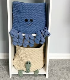 a crocheted chair with a stuffed animal in it