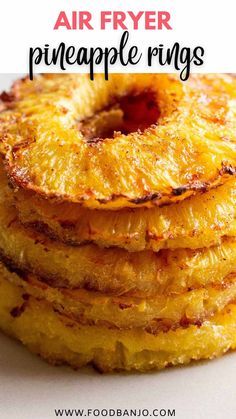 pineapple rings stacked on top of each other with the words air fryer pineapple rings