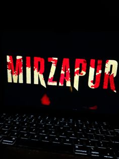 a laptop computer with the word mirapurr lit up on it's screen