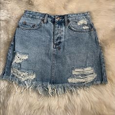 New. Size 26. Tag Attached. New. Smoke And Pet Free Home. Guaranteed Authentic. Ksubi Blue Denim Mini Skirt Mid-Rise, Belt Loops, Five Pockets, Distressed And Faded Finish, Frayed Hem, Designer Embroidery Partially Concealed Button Fastenings At Front. 100% Cotton. New, Size 26. No Flaws. Smoke And Pet Free Home. Msrp $170 Blue Denim Mini Skirt, Designer Embroidery, Distressed Skirt, Mini Denim Skirt, Denim Mini, Denim Mini Skirt, Denim Skirt, Blue Denim, Mini Skirt