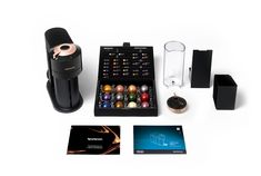 the contents of a coffee maker and other items are shown on a white table top