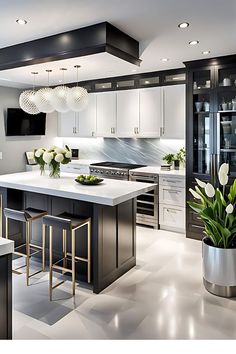 a modern kitchen with white and black decor