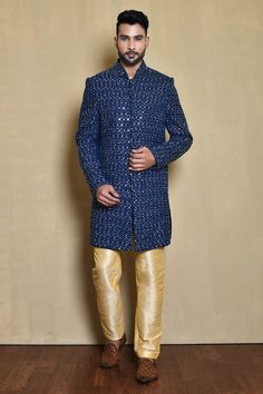 Blue sherwani with all-over embroidered work. Comes with golden pant. - Aza Fashions Gold Sherwani With Mirror Work For Diwali, Bollywood Style Ceremonial Sherwani With Mirror Work, Fitted Royal Blue Kurta With Zari Work, Bollywood Style Sherwani With Mirror Work For Ceremonial Occasions, Bollywood Style Sherwani With Mirror Work For Ceremonial, Bollywood Sherwani With Mirror Work For Ceremonies, Gold Bandhgala With Gota Work Traditional Drape, Diwali Sherwani With Gota Work In Traditional Drape, Bollywood Style Ceremonial Bandhgala With Mirror Work