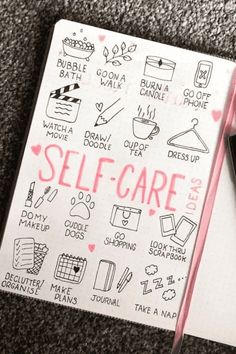 a notepad with writing on it that says self care next to a cell phone