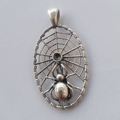 A whimsical silver spider and web pendant. The dainty spiderweb and spider are made of solid 925 sterling silver. The perfect accessory for your Halloween costume or to show your love of spiders. Made with high-quality 925 Sterling Silver  Highlights: - Handmade item - Dispatches from a small business in Greece 🇬🇷  - Materials: Silver - Style: Gothic Spider Pendant, Silver Highlights, Style Gothic, Insect Jewelry, Silver Style, Spiders, Handmade Sterling Silver, Sterling Silver Pendant, Solid 925 Sterling Silver