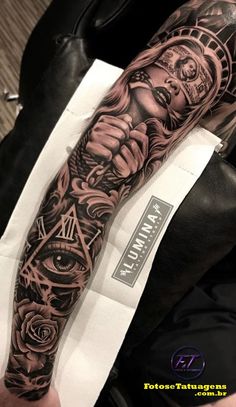 a man's arm with tattoos on it