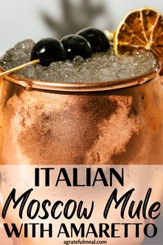 an italian moscow mule with black olives and lemon