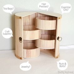 an open wooden cabinet with instructions on how to use the doors and drawers for storage