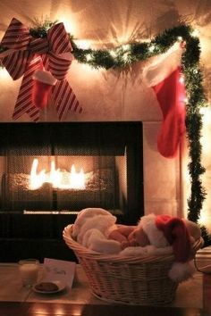 a christmas fireplace with stockings and presents on the mantle