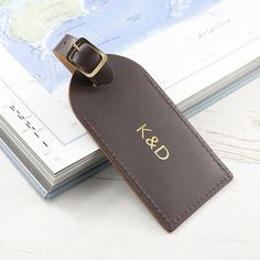 Luxury leather luggage tag with gold buckle, the perfect gift for a professional or a leaving present for the budding traveller! Personalised with up to three initials which are carefully hand stamped with metallic gold, adding a touch of luxe.Made from genuine leather.Product Specification Length: 12cm Width: 6cmA perfect little stocking filler gift for Christmas or as a small present for someone that you know loves travelling.Materials: Leather Leaving Presents, Silver Handbag, Leather Luggage Tag, Stocking Filler Gifts, Personalized Luggage, Leather Luggage Tags, Pink Feathers, Glitter Glass, Leather Luggage