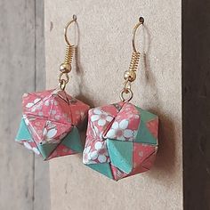 Beautiful origami sonobe earrings, made my me. These are a limited run, with only one of each paper combination made, so they are a truly unique gift for someone, or for yourself! All my origami and paper earrings have a protective coating to make them weatherproof,  although I still wouldn't recommend having a bath with them! The earring hook is made from plated copper, nickel-free, and low allergenic. Handmade Geometric Earrings For Gift, Unique Geometric Earrings As Gift, Botticelli Art, Beautiful Origami, Paper Earrings, Earring Hook, Le Crochet, Limited Run, Jewelry Earrings Dangle