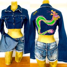 Rare, New-With-Tags, Vintage 2000’s, Deconstructed Jean Jacket By Nude Designs Los Angeles Size Medium. 97% Cotton, 3% Spandex And Is Hand-Washable. From The Famous Nude Boutique On Melrose Avenue In Los Angeles. Stretch Denim With Fabulous Hand-Painted Sequin Dragon And Logo At Back. Logo Button Closure At Front, Split Bell Sleeves. Approximate Unstretched Measurements When Fastened Are 32” At Bust, 13” In Length, 29” At Waist, 26” Sleeve Length, 16” Shoulder-To-Shoulder, 14” Around Sleeve Cuff Fitted Denim Cropped Jacket For Streetwear, Fitted Casual Cropped Jacket For Streetwear, Casual Fitted Cropped Jacket For Streetwear, Y2k Fitted Long Sleeve Outerwear, Blue Long Sleeve Cropped Jacket For Streetwear, Reworked Long Sleeve Denim Jacket For Winter, Spring Long Sleeve Cropped Jacket For Streetwear, Long Sleeve Cropped Jacket For Spring Streetwear, Spring Fitted Streetwear Outerwear