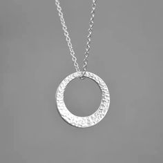 Minimalist Hammered Sterling Silver Circle Necklace. Washer Pendant. Gift For Her. This sterling silver washer pendant looks great on its own or layered with other necklaces. It has been hammered to create a modern design. It hangs on a sterling silver extendable link chain 18-20"/45-50cm  Pendant size: 2 cm (0.7") in diameter. The necklace will come in a beautiful gift box.  * CHECK OUT MORE JEWELLERY *   www.etsy.com/shop/kailajewellery Simple Nickel Free Silver Necklace, Simple Hammered Silver Jewelry, Minimalist Silver Circle Necklace, Silver Circle Charm Necklace In Sterling Silver, Silver Circle Sterling Silver Charm Necklace, Silver Sterling Silver Circle Charm Necklace, Sterling Silver Nickel-free Open Circle Necklace, Simple Nickel-free Round Necklace, Minimalist Silver Hammered Charm Necklaces