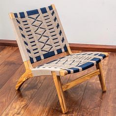 a wooden chair sitting on top of a hard wood floor