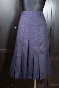 Vintage Dark Blue New Wool Pleated Skirt | Accordion Pleated Skirt | EU 40 skirt The skirt is in a good condition. MEASUREMENT (taken flat) Waist: 80 cm (doubled) Length: 74 cm Weight: 525 g MATERIAL: 100% new wool, lining: 100% acetate BRAND: Lady H/hammer  In case of any questions, please, contact me. Double Pleated Skirt, Fitted Winter Bottoms With Pleated Hem, Fitted Full Skirt With Pleated Hem, Fitted Purple Pleated Lined Skirt, Fitted Blue Skirt With Pleated Hem, 40 Rocks, Wool Pleated Skirt, Knife Pleated Skirt, Knife Pleat