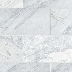 white marble tiles with grey veining