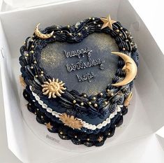 a heart shaped birthday cake in a box