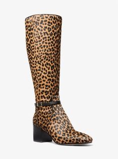 With a clean, classic silhouette and a slim buckled strap at the ankle, the Ella is the wear-with-everything boot you’ve been looking for. Made from leopard-printed calf hair, the boot has a substantial stacked heel that will keep you walking tall day and night. Michael Kors High Heels, Heeled Combat Boots, Leopard Ankle Boots, Heel Boots For Women, Wide Width Boots, Walking Tall, Michael Kors Boots, Simple Black Dress, Hair Trim