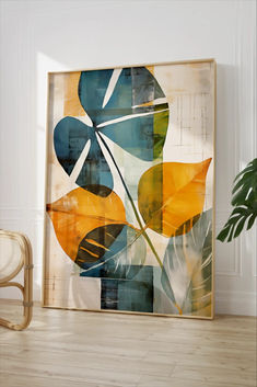 an abstract painting on the wall next to a chair and potted plant in a white room