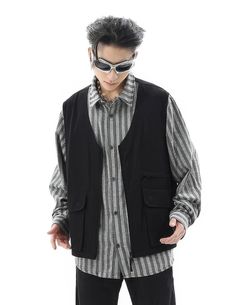 Embrace the fusion of comfort and style with our Striped Mock Layered Vest Long Sleeve Shirt, a statement piece that's both versatile and on-trend. Crafted with attention to detail, this shirt features a mock layered vest that gives the illusion of depth, paired with striking striped patterns that elevate its visual appeal. The relaxed fit ensures easy movement, making it an ideal choice for those who value both style and comfort. Whether you're heading to a casual meet-up or dressing up for a night out, this shirt is easily styled with jeans or slacks for a look that's effortlessly cool. Its unique design embodies a nonchalant and moody aesthetic that reflects a sophisticated yet laid-back lifestyle. Product specifications: Material: 100% Polyester Fit: Relaxed and comfortable Closure: Ea Illusion Of Depth, Striped Sleeve, Mens Outerwear, Long Sleeve Shirt, Black Shirt, Sleeve Shirt, Pattern Design, Night Out, Long Sleeve Shirts