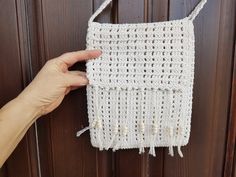 This is a beautiful small crossbody bag - ecru cotton crochet one long strap bag. Has zippered Acetate lining.  In good condition. Measures:  Height  10" (26 cm) without strap Width  8" (20 cm) Thanks for visiting my shop! OLaLaVintage White Crochet Crossbody Shoulder Bag, White Bohemian Crochet Bag With Adjustable Strap, Cream Crochet Crossbody Bag With Adjustable Strap, Bohemian Beige Crochet Bag With Fringe, White Bohemian Crochet Crossbody Bag, Eco-friendly Beige Crochet Bag With Adjustable Strap, Bohemian Beige Hand-knitted Shoulder Bag, Crochet Shoulder Bag, Small Crossbody Bag