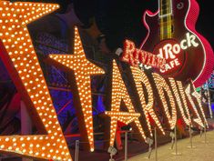 the neon signs are all lit up and ready to be used as decorations for an event