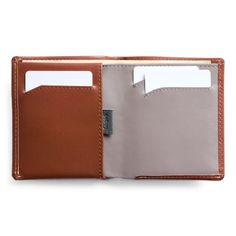 A slim, trim, handsome leather wallet Everyday Leather Trifold Wallet With Flat Pocket, Classic Bifold Card Holder With Flat Pocket, Modern Wallets With Leather Lining For Everyday Use, Bifold Wallet With Flat Pocket For Daily Use, Bifold Card Holder With Flat Pocket For Daily Use, Brown Leather Wallet With Flat Pocket, Modern Brown Trifold Wallet For Travel, Modern Brown Wallet With Interior Card Slots, Modern Brown Bifold Wallet