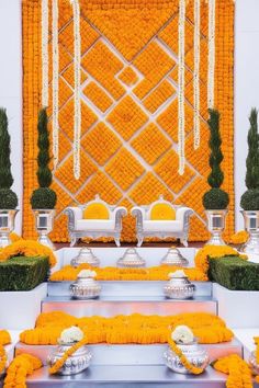 an orange and white wedding decorated with flowers