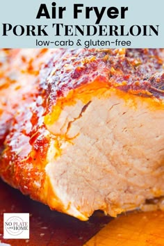 an air fryer pork tenderloin on a cutting board with text overlay