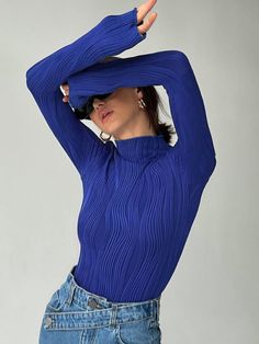 The jersey shirt featured with new stripe fabrication let body extension flexibly and breath. Blue Funnel Neck Top For Fall, High Stretch Ribbed Funnel Neck Top, High Stretch Blue Winter Top, Fall Blue High Neck Tops, Blue High Neck Top For Fall, Blue Stretch Turtleneck For Fall, Trendy Blue High-stretch Tops, Ribbed Stretch Funnel Neck Tops, Trendy High Stretch Blue Tops