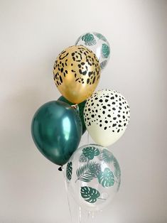 a bunch of balloons that are sitting on top of each other