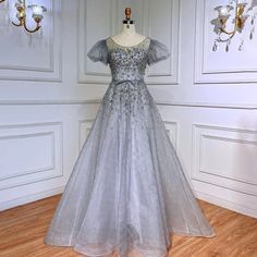 Elegant Silver Gray Evening Dresses: 2024 Luxury Dubai Gowns for Women's Wedding Parties Luxury Ball Gown For Prom Season Banquet, Luxury Ball Gown For Banquet During Prom Season, Floor-length Gown For Debutante Ball Gala, Elegant Ball Gown Evening Dress With Intricate Embroidery, Luxury Ball Gown For Banquets, Elegant Ball Gown With Intricate Embroidery, Luxury Floor-length Ball Gown For Banquet, Luxury Festive Gown For Banquet, Luxury Floor-length Evening Dress For Debutante Ball