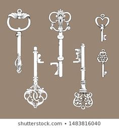 an assortment of antique keys in various shapes and sizes, all with ornate designs on them