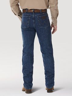 JEANS ALMOST AS TOUGH AS A PBR BULL RIDER. You'll see these jeans on fans at PBR events across the country. Decorative embroidery appears on the hip pocket and PBR is labeled on the waistband. Pbr Bull Riders, Bull Rider, Decorative Embroidery, Bull Riders, Wrangler Jeans, Dark Wash Denim, Slim Fit Jeans, Men's Jeans, Mens Jeans