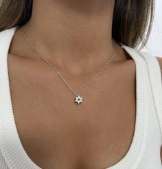 The Star of David is a hexagram, formed by two intertwined triangles. Known in Hebrew as the Shield of David, it's a symbol of Jewish identity and Judaism. The chain and pendant made of sterling silver.  The pendant can be made blank or set with zircons.  The necklace will arrive gift-wrapped and packed in a padded envelope to maintain the product Thank you for your interest. Please check out our other items and be sure to add us to your favorites! https://www.etsy.com/il-en/shop/Limajewelry We White Sterling Silver Star Of David Jewelry, White Star Of David Charm Jewelry, Magen David Necklace, Jewish Star Necklace, David Star, Star Of David Necklace, Judaica Jewelry, Chain And Pendant, Jewish Star