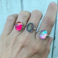 Elegant Oval Bright Colored Faceted Aurora Opal Doublet Sterling Silver | Neon Stone Ring | Faceted Gemstone Ring | Solitaire Ring | Boho by GildedBug on Etsy Pink Oval Opal Ring In Sterling Silver, Unique Oval Iridescent Jewelry, Unique Iridescent Oval Jewelry, Iridescent Opal Ring Oval Shaped, Iridescent Oval Opal Gemstone Ring, Iridescent Oval Cabochon Ring, Pink Oval Cabochon Opal Ring, Multicolor Oval Cabochon Opal Ring, Iridescent Oval Rings For Gifts