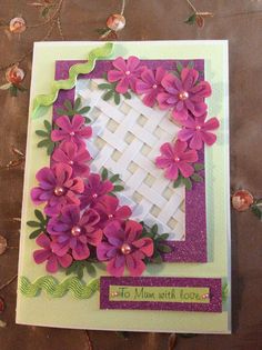 a close up of a card with flowers on it