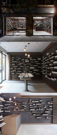 the inside of a store with shelves full of bottles and wine glasses on display in it