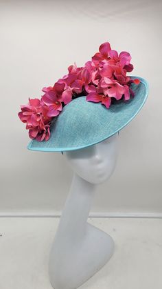 Beautiful sinamay Turquoise Blue fascinator with different shade of hot pink flowers. It is secured with a headband. Wedding Fascinator Bridesmaids Hat Kentucky Derby Cocktail Party Tea Party Guest Easter Kate Middleton  - Headband - Ready to ship  - Lightweight - Free Shipping - Fast shipping - Customize by adding different color flowers and or feathers Check my store for styles and colors.  Hatsandpearls.etsy.com Find more at my website: Www.hatsandpearls.com  Reach out to me if you can't find what you are looking for.  I can make cake custom orders and help you style and match your outfit  Tag and share your pictures when you wear and style our hats.  Instagram: @hats_pearls Facebook: Hats Pearls Thank you for visiting and happy shopping! Blue Spring Hat With Structured Crown, Blue Structured Crown Hat For Spring, Spring Turquoise Headpiece For Parties, Spring Blue Hat With Structured Crown, Turquoise Fascinator For Spring Party, Turquoise Headpiece For Summer Wedding, Turquoise Spring Party Fascinator, Spring Party Turquoise Fascinator, Turquoise Headpieces For Summer Weddings