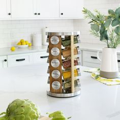 a kitchen counter with a spice rack on it