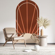 a living room scene with a chair, vase and plant on the floor in front of an orange door