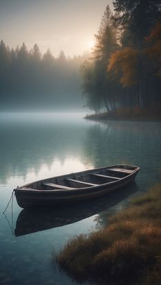 a row boat sitting on top of a body of water