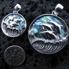 Wave Dolphin Necklace Pendant Small 20mm Large 30mm International customers please keep in mind that you might need to pay customs fee upon receiving item depending on your country regulations. Gift velvet drawstring pouch baggie included with each order. To better understand the size of item please look thru images, each of listings contains item next to a dime coin, which is 0.7 inch in diameter. Pieces with Abalone (Paua) Shells have unique patterns and colors. Every single one is unique. Col Ocean-inspired Sterling Silver Jewelry, Abalone Shell Inlay Jewelry For Gifts, Dolphin Necklace Pendants, Fancy Envelopes, Hawaii Gift, Hawaii Jewelry, Dolphin Necklace, Wave Necklace, Hawaiian Jewelry