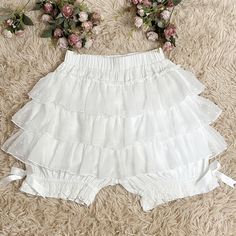 This bloomer with an inner lining features a multi-layered pleated skirt design with printed patterns on the skirt. The inner lining bloomers have lace edges and butterfly decorations. This item combines both Lolita and kawaii elements, making it a perfect choice for those who love both styles.   This price is for a pair of bloomers only, others are not included.   	 		 			Size 			Free Size 		 		 			Waist 			60-100 		 		 			Hips 			120 		 		 			Full Length 			42 Y2k Japan, Lace Lanterns, Lace Edges, Gothic Skirts, Japan Kawaii, Black Lace Shorts, Pants Y2k, Cake Lace, Summer White