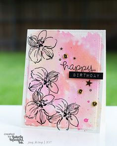 a handmade birthday card with flowers on it