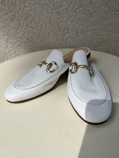 Pascucci white leather mule flat shoes gold buckle Sz 6 Italy | eBay White Mules With Buckle Closure For Formal Occasions, White Luxury Formal Mules, Luxury White Mules With Round Toe, Luxury White Round Toe Mules, Designer White Formal Mules, Designer White Slip-on Mules, White Slip-on Mules With Buckle Closure, White Round Toe Mules For Office, White Flat Mules With Leather Sole