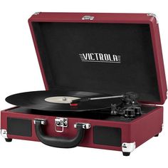 a red suitcase with a record player in it