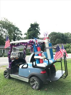 a golf cart decorated with american flags and decorations for the fourth of july, 2013