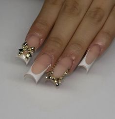 bling white short french tip Scattered Rhinestone Nails, White French Tip With Gold Charms, Gold Rhinestone French Tip Nails, Short French Tip Nails With Rhinestones, White Nails Diamonds, Gold And White French Tip Nails, White French With Gold, French Nails With Bling, Short Nails Charms